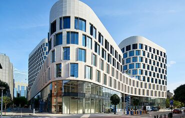 Front view of the Quatuor commercial building in Brussels, Belgium.